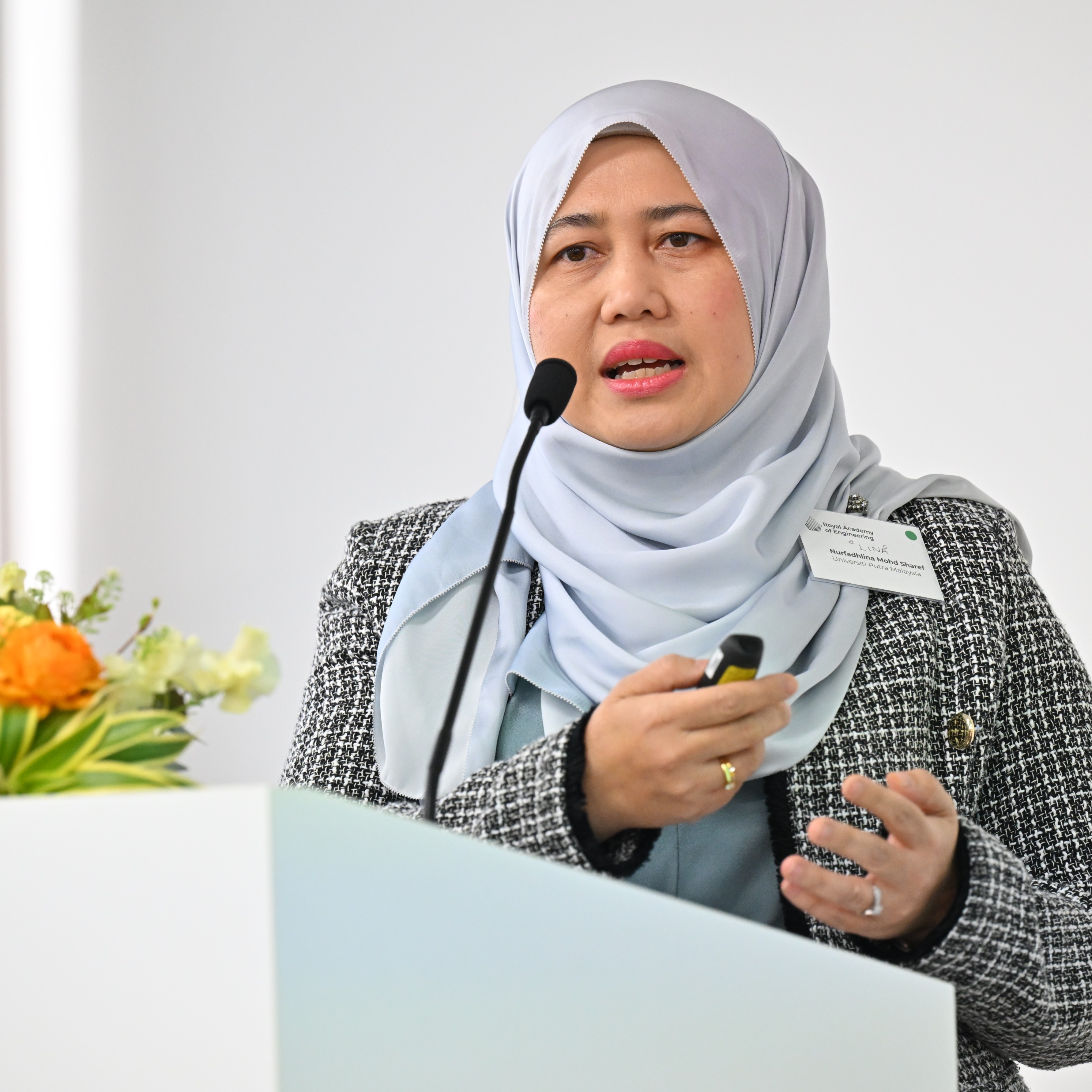 Professor Nurfadhlina presenting during Session 1.