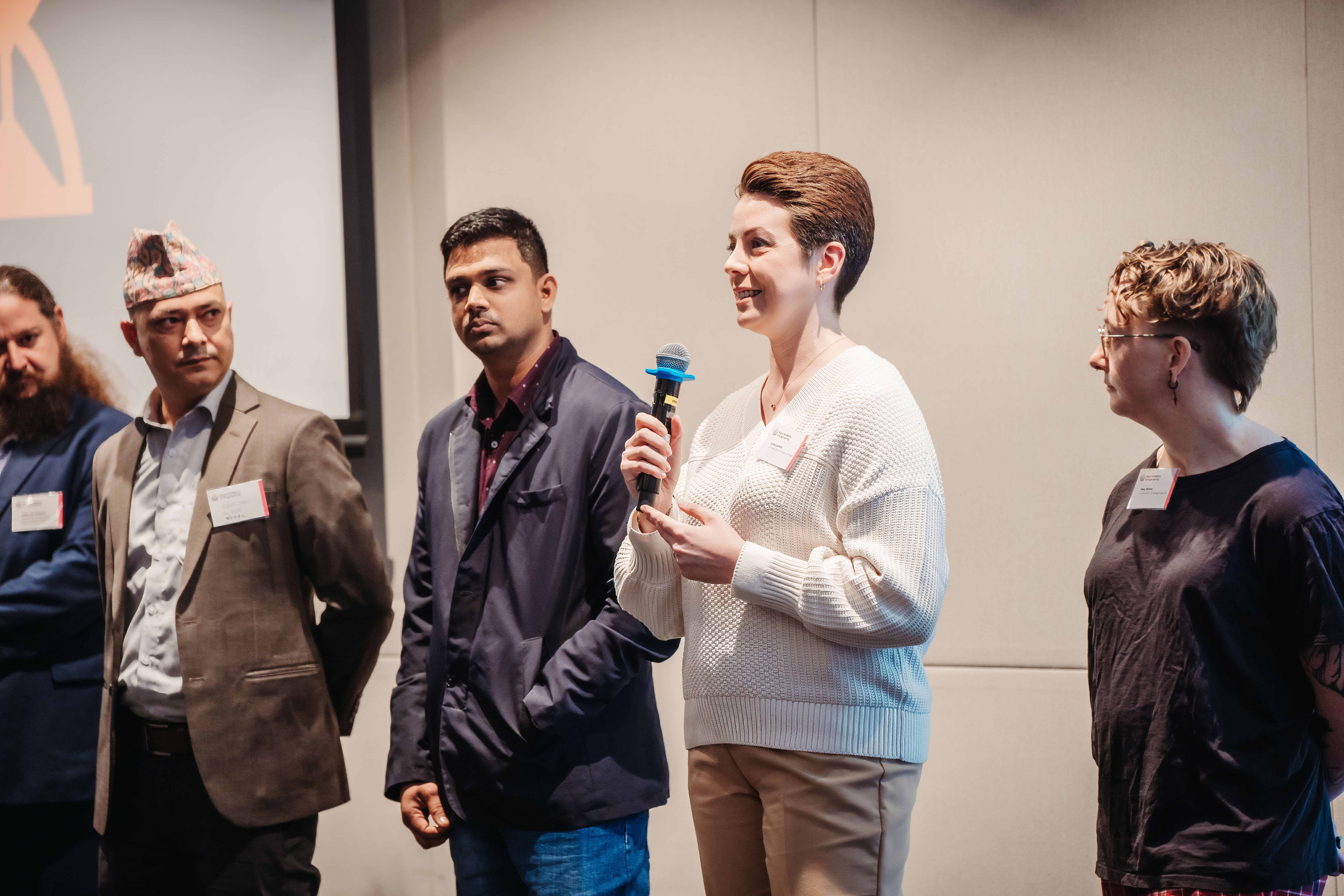 Group of Frontiers delegates sharing their discussion with the audience
