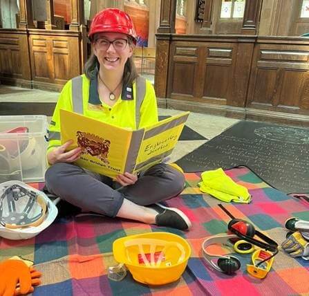 Kate Castle, one of the engineers involved in the project, reading a bedtime story.