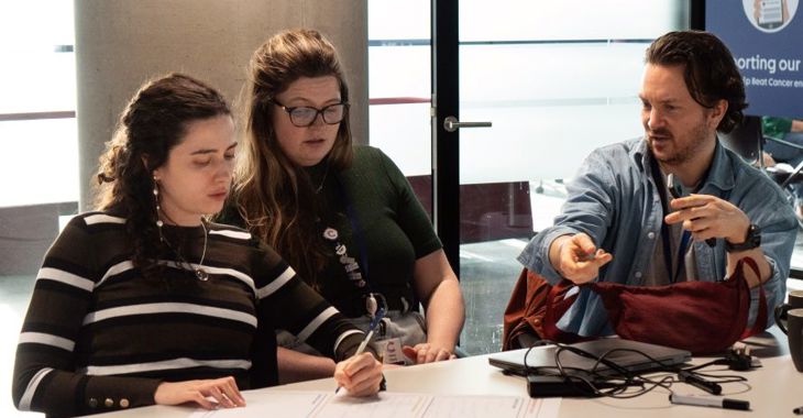 Participants working on an exercise in a group 