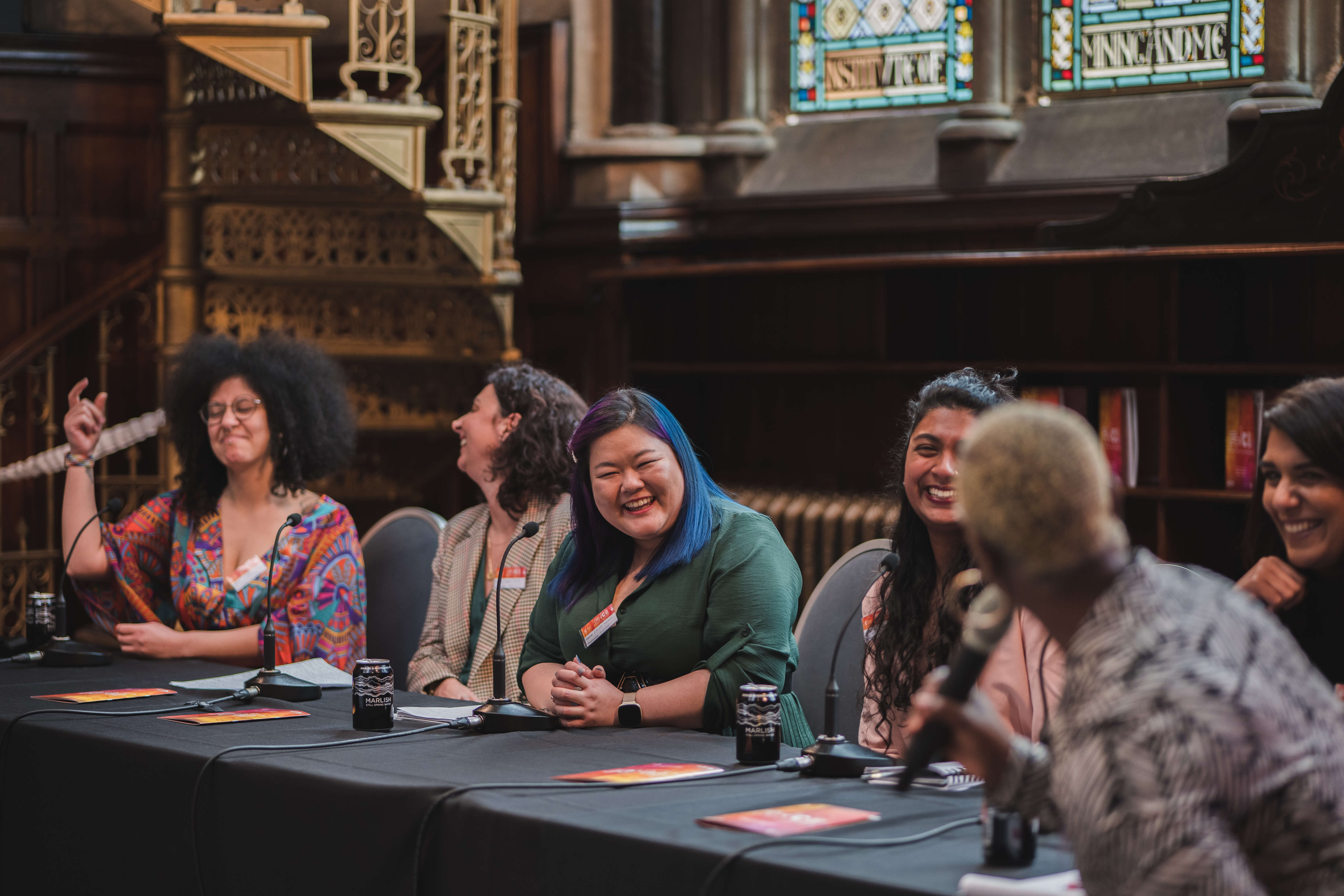 Picture showing a panel of women speakers
